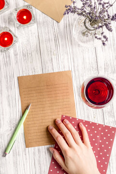 concept Valentine's Day love letter wooden background top view