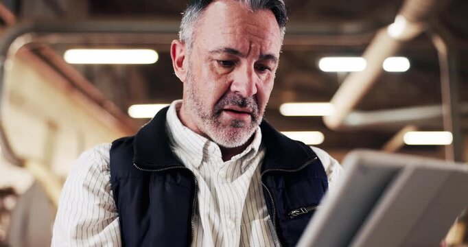 Carpentry, thinking and man on tablet in workshop for planning, inspection and woodworking. Carpenter, mature and person on tech for inventory, furniture design and checklist for timber production