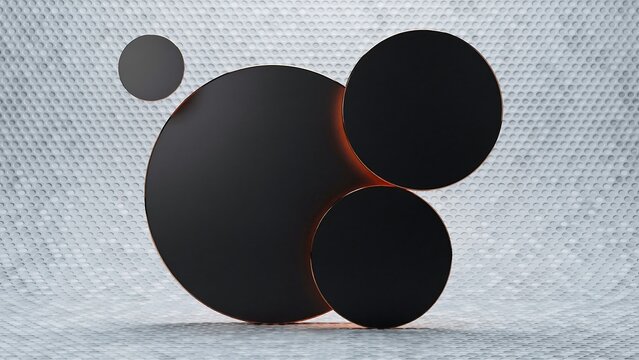 Three black circular discs arranged on a textured silver metallic background, with orange light glow