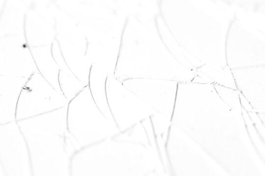 Realistic cracked glass texture overlay isolated on transparent background. High-quality PNG for photo editing and graphic design.