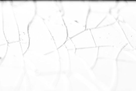 Realistic cracked glass texture overlay isolated on transparent background. High-quality PNG for photo editing and graphic design.