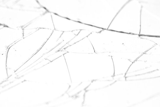 Realistic cracked glass texture overlay isolated on transparent background. High-quality PNG for photo editing and graphic design.