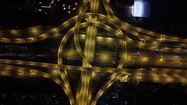 Rotating shot of a busy overpass at night.