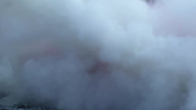 fire extinguisher putting out flames with powder. Safety, emergency response, and firefighting training concept footage.