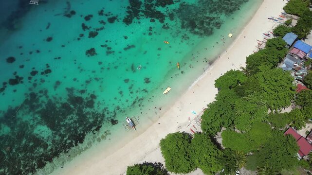 Birdseye View Of Crystal Beach Lagoon Clear Water White Sand Palm Trees Samal Island Philippines Drone Pan 4K 30FPS