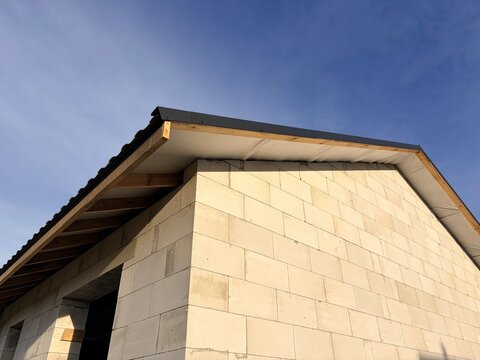 House under construction. Ongoing building roof process.