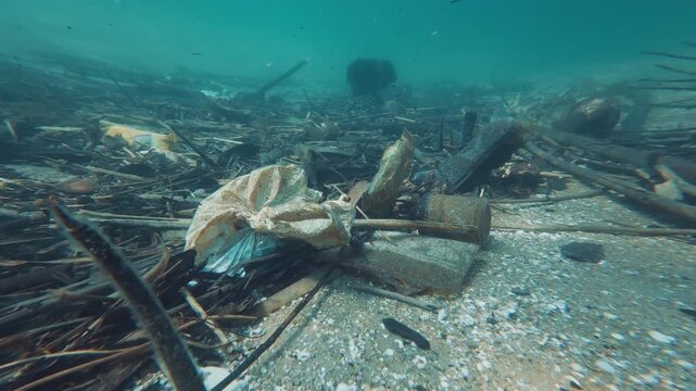 Underwater view of the garbage on the sea bed near the island of Ilha Grande in Brazil