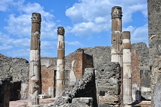 Four Freestanding Partially Reconstructed Fluted Columns in the House of the Faun, Pompeii