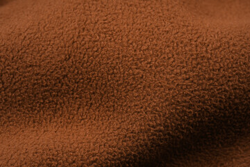 Texture of fleece fabric and its inner or back side, background or backing. Clothing, sewing. Faux fur. Background with fur structure.  © stas_malyarevsky