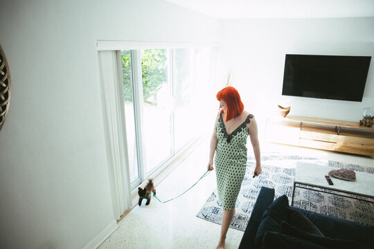 woman walking pomeranian