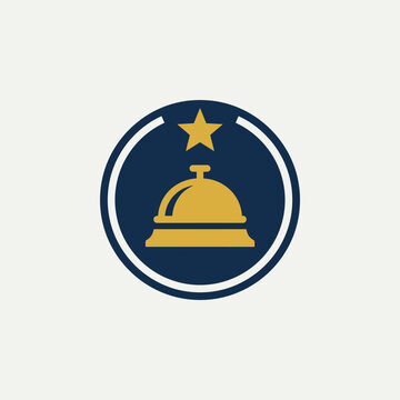 Golden bell with a star on top.