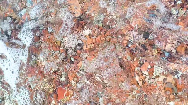 Colorful pebble beach texture close up background
