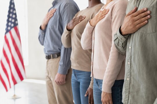 Unity in diversity displayed as individuals pledge allegiance, symbolizing patriotism