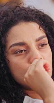 Woman, thinking or anxiety in home with biting nails, bad habit or nervous tension in living room. Mental health, stimming or person with depression, compulsive behavior or coping mechanism in lounge