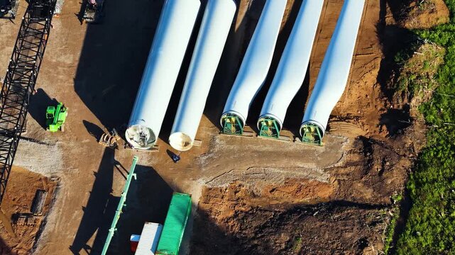 Aerial view of wind turbine blades on a construction site for a new wind farm