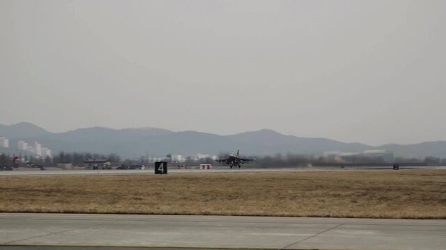 Air Force F-16 Fighter Jet Launching from Runway During Military Exercise
