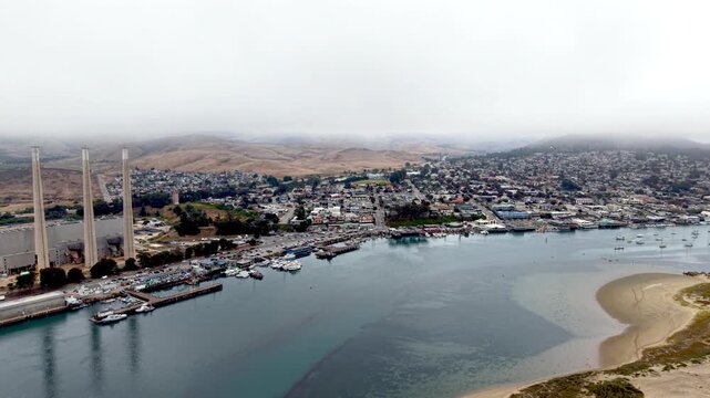 high aerial push in to morro bay california