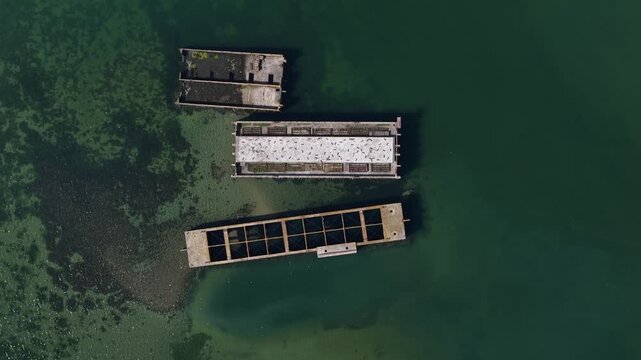 Aerial view of the historic Phoenix caissons at Schelphoek, showing Dutch flood defense heritage, dike repair and the former 1953 disaster site in Zeeland.