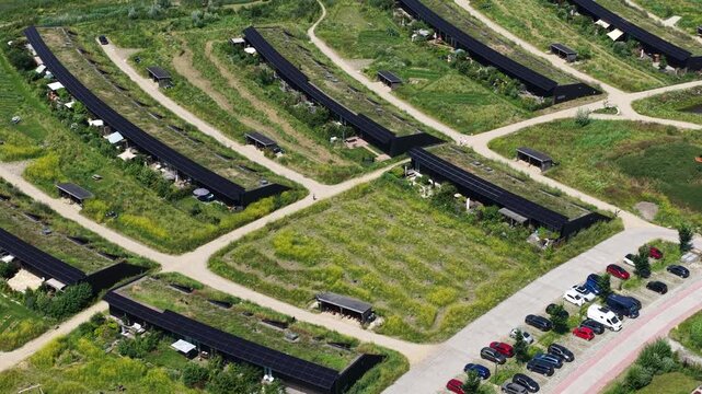 Aerial view of Ecovillage in Almere, the Netherlands, showing sustainable homes, biodiverse landscaping, nature inclusive architecture and climate adaptive residential design.