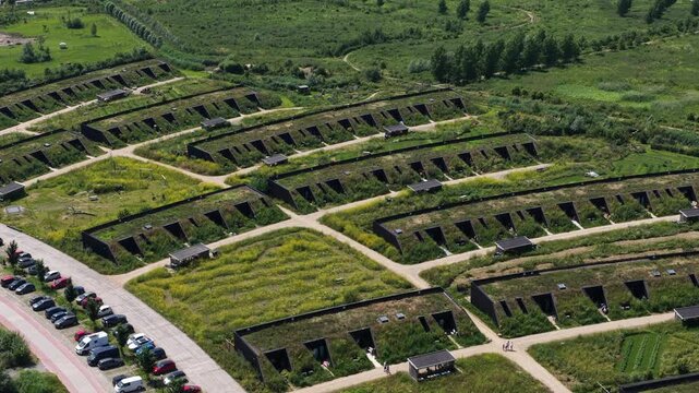 Aerial view of Ecovillage in Almere, the Netherlands, showing sustainable homes, biodiverse landscaping, nature inclusive architecture and climate adaptive residential design.