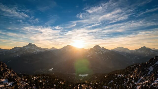 Vibrant Sunrise Illuminating Mountain Ranges