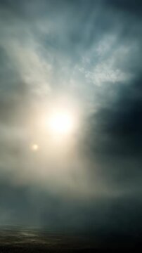 Mysterious ethereal sunlight breaks through dense fog over a tranquil landscape, creating a surreal and dreamy atmosphere. Soft light rays and mist blend seamlessly in this captivating scene