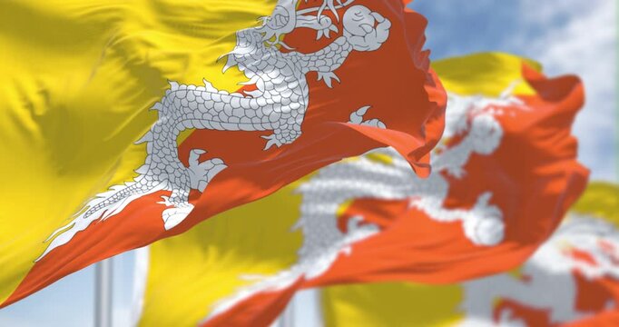 Close-up of Bhutan national flags waving in the wind.