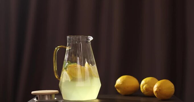 Juice pitcher and fruits on film strip, recipe video
