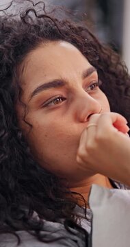 Mental health, thinking or woman in home with biting nails, bad habit or nervous tension in living room. Anxiety, stimming or person with depression, compulsive behavior or coping mechanism in lounge