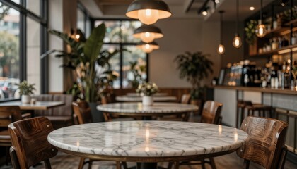 Obraz premium Modern Cafe Interior with Marble Tables and Pendant Lighting