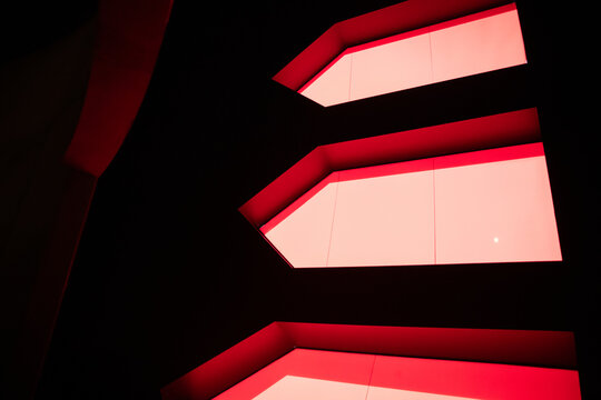 Modern Architecture Featuring Red Geometric Windows