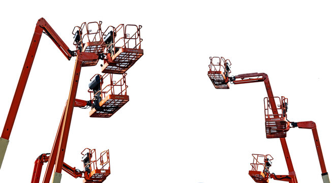 Orange articulated boom lifts with elevated aerial work platforms isolated against bright sky. Construction equipment, industrial maintenance, engineering service, rental fleet and safe access.