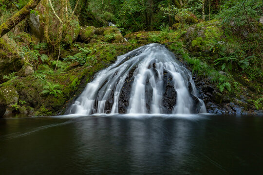 Idyllic waterfalls on the River Edo in Castro Caldelas, Ourense, Galicia, Spain