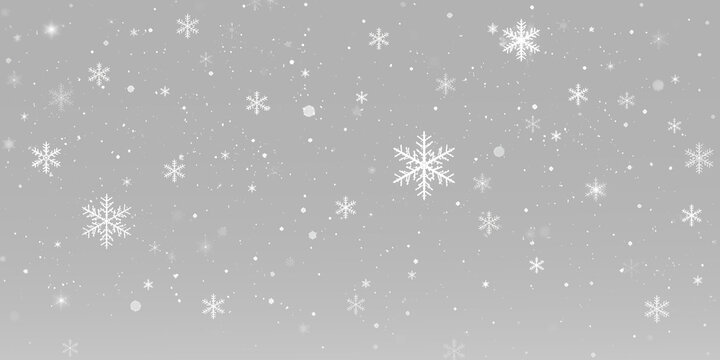 Christmas snowflakes with falling white snow particles, sparkling winter frost and festive snowfall