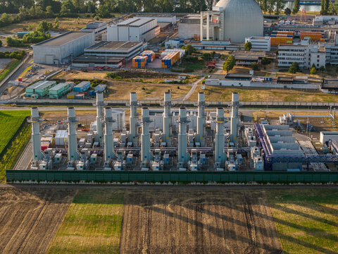 Aerial view of Gaskraftwerk Biblis BNBM power plant with industrial chimneys and technical facilities near the decommissioned nuclear reactor site in Biblis, Hessen, Germany.