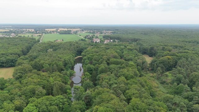 High elevated view of Devil's Bridge Aerial 4K surrounded by Lush Green Natural Reserve