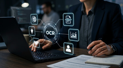 Fototapeta premium Businessman holding ocr optical character recognition icon technology