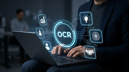 Fototapeta premium Businessman using laptop for ocr optical character recognition ai