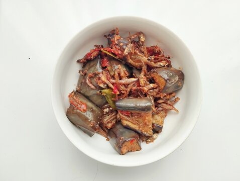 stir fried eggplants with anchoives or balado terong teri is traditional cuisine from Indonesia which tasted spicy