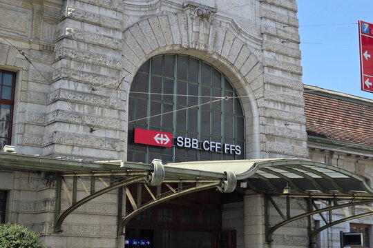 Basel, Switzerland, May 25, 2026: Historic Railway Station Architecture with SBB CFF FFS Signage in Outdoor Urban Setting