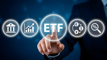 Fototapeta premium Businessman touching ETF button with icons of bank, growth chart, currency exchange, and percentage magnifier on digital interface, representing exchange-traded fund investment concept, finance