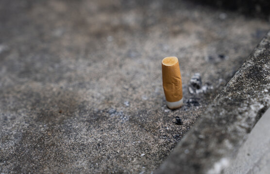Cigarette butts in the ashtray.