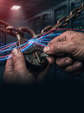 Hands Unlocking Padlock with Fiber Light for Anti Trafficking Concept