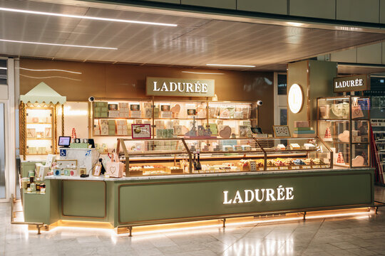 Paris, France - January 28, 2026: Ladur&eacute;e boutique selling macarons, pastries, chocolates and gourmet gifts inside Paris Orly Airport Terminal 4.