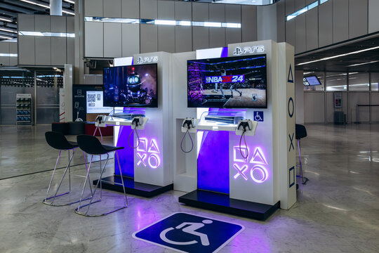 Paris, France - January 28, 2026: Accessible PlayStation 5 gaming stations with Sony PS5 consoles available for travelers inside Paris Orly Airport Terminal 4.