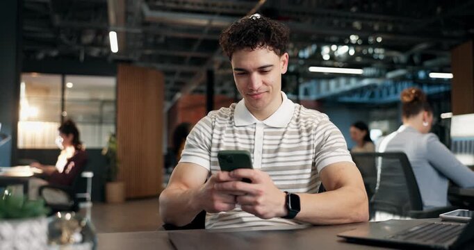 Smile, business and man in office with phone, news research and email source to confirm facts. Male person, coworking and review in workplace with mobile, proofreading and story draft for publication