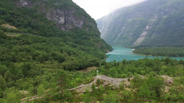Right Panning Drone View Across Lovatnet and Ramnefjellet in Norway