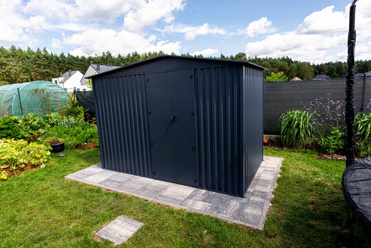 Modern anthracite garden shed providing backyard storage solution
