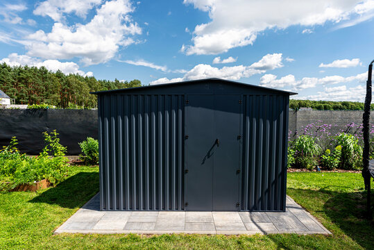 Anthracite modern metal garden shed providing outdoor storage