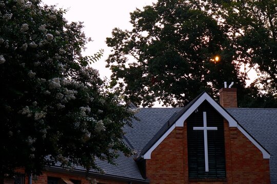 Sun rises over crucifix 